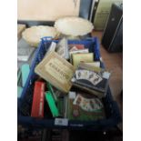 A tray of various playing cards and card games