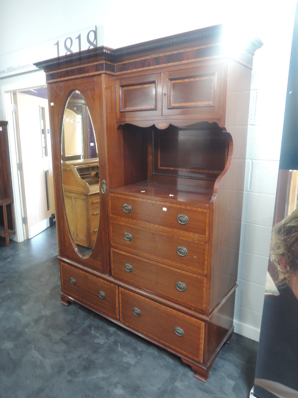 An Edwardian mahogany combination wardrobe, having inlay and crossband decoration, with cupboard