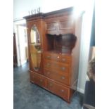 An Edwardian mahogany combination wardrobe, having inlay and crossband decoration, with cupboard