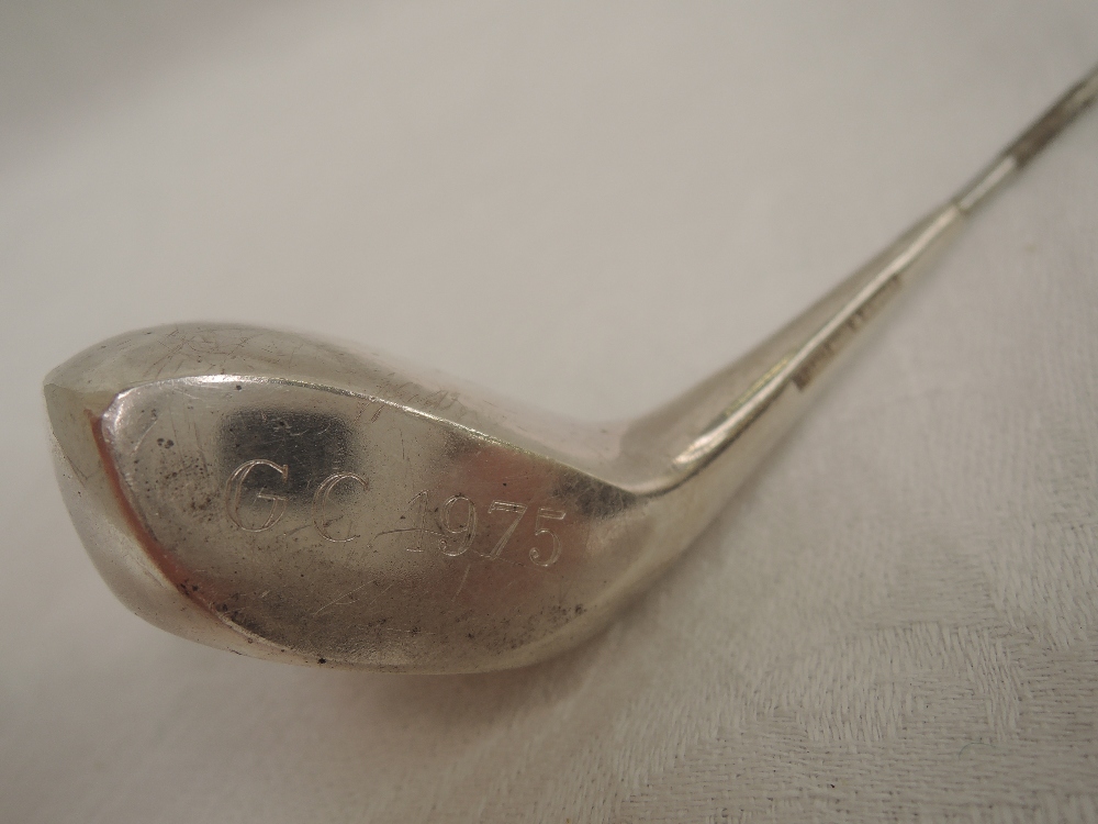 A white metal trophy modelled as a weighted golf club by Frigast Denmark, engraved GC 1975 - Image 2 of 2