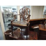 An Edwardian mahogany salon dining armchair in the Hepplewhite style having Prince of Wales crest