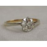 A lady's old cut diamond solitaire dress ring, approx 1.1ct in a claw setting (some claws missing)