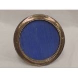 An HM silver photograph frame of circular form, Birmingham 1970, W I Broadway & Co