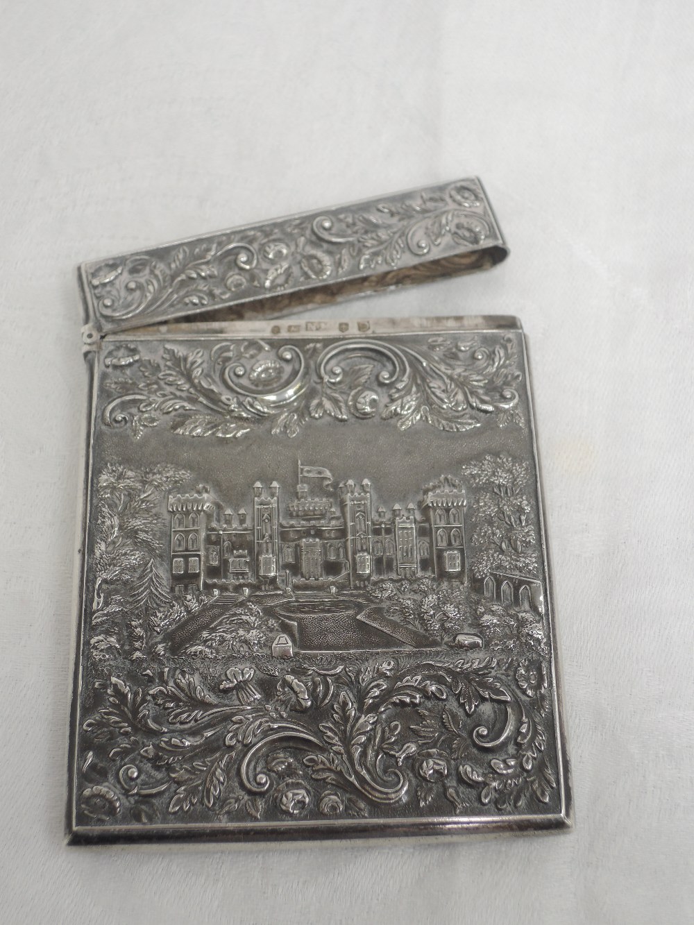 A Georgian silver castle top card case of rectangular form by Nathaniel Mills having a raised