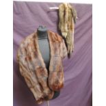 A brown mink evening stole retailed by Capstick & Hamer Morecambe, and a mink stole