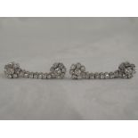 A pair of diamond earrings, approx 2.1ct having diamond clusters with diamond drops to further