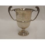 A small silver trophy presented by the RAF in the 440 yards championship 1920, having scroll handles