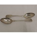 A pair of Victorian silver table spoons of fiddle back design monogrammed F to terminals, London