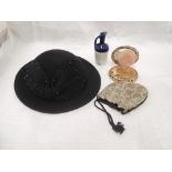 A lady's 1980's black wool felt hat by Adolfo New York having beaded bow decoration, a 1950's