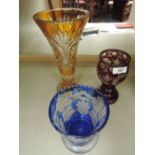 A Bohemian cut flash glass vase in yellow, a similar Stevens & William Bohemian squat vase in blue