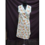 A lady's vintage floral cotton wrap over overall/apron having label by John Hawkins & Sons Ltd (