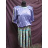 A lady's 1980's dress in shades of purple, mustard and turquoise by Dale Tryon Kanga collection hav