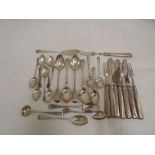 A selection of HM silver teaspoons and fruit knives and forks including Georgian and Victorian