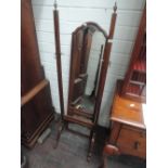 An early/mid 20th century mahogany frame cheval mirror in the Queen Anne style having splay legs