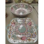 A Bursley ware, Charlotte Rhead design bowl having floral tube line decoration and a similar dish