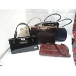 Six vintage hand bags of various colours and designs including Maclaren, St Michael & Waldybag