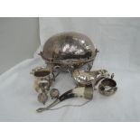 A small amount of silver plated items including a covered dome topped tureen, sauce boat, cream jug,