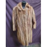 A ladies brown mink coat retailed by F W Scott of Huddersfield