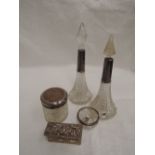 Five cut glass dressing table bottles and pots having HM silver collars and lids