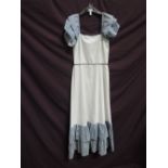 A lady's 1970's long dress by Sheridan Barnett for Simon Massey London having white cotton bodice