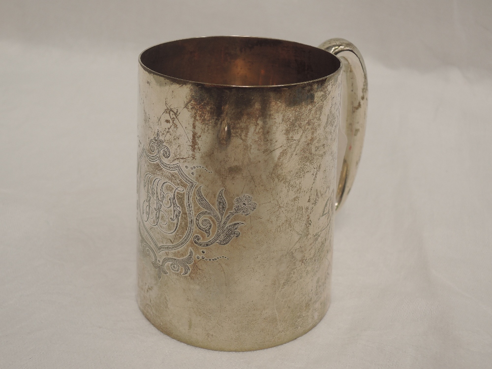 A silver tankard of plain form having monogram within cartouche, Sheffield 1923, Walker & Hall