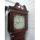 A late 18th/early 19th century longcase clock having swan neck, pillar hood containing square