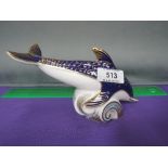 A Royal Crown Derby paperweight modelled as dolphin on wave, gold stopper