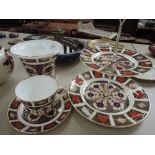 A Royal Crown Derby vase, in the Imari palette 1128, a similar cake stand, and a similar cup and