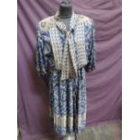 A lady's 1980's dress in shades of blue in taupe by Dale Tryon Kanga collection having elasticated