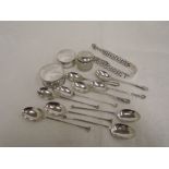 A selection of HM silver including napkin rings, button hook, sugar nips and teaspoons