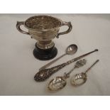 A small selection of HM silver and white metal including a small 1930's golf trophy, button hook and