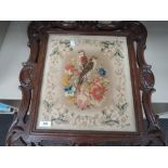 A Victorian mahogany frame Berlin woolwork tapestry having bird and foliage decoration