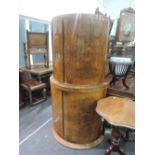 An early/mid 20th century Art Deco design walnut demi lune cocktail cabinet having fitted interior