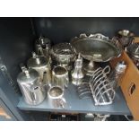 A selection of plated ware including teaset, caster, toast racks, rose bowl and tazza etc
