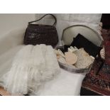 A selection of lady's vintage items including evening bag, gloves, handbag, three net/lace