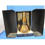 A Whyte & Mackay deluxe 12 year old whisky in pot still decanter in original box