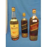 Three bottles of whiskey, one litre of Bell's, one litre Johnnie Walker Red Label and one 26 & 2/3fl