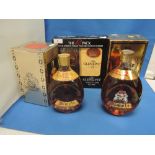 Four bottles of whiskey , one litre Deluxe Dimple 12 year old, one 750ml 12 year old Dimple, the