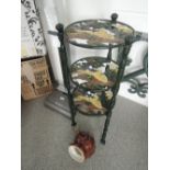 A cast painted pan stand