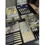 A selection of boxed flatware