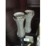 A pair of cut glass bud vases with HM silver rim