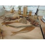 A selection of carved animal studies and bookends etc