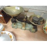 A set of H Pooley & Son Birmingham kitchen scales and weights and ceramic bed warmer