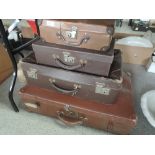 Four vintage travel cases