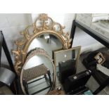 Three gilt framed wall mirrors