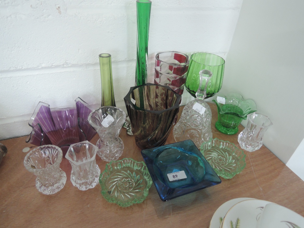 A selection of cut and art glass vases etc