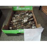 A box of white metal and plated flatware