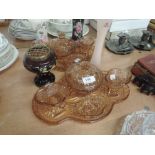 Two dressing table trays and trinket boxes in burnt orange glass and four vases