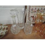 Two cut glass decanter and a vase