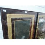 Two decorative picture frames with gilt inner frame